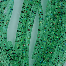 Load image into Gallery viewer, Color Code 0021: Transparent Emerald Plastic with Emerald Glitter, Blue Glitter, and Holographic Gold Glitter
