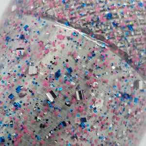 Color Code 0017: Clear Plastic with Pink Glitter, Silver Glitter, and Blue Glitter with UV