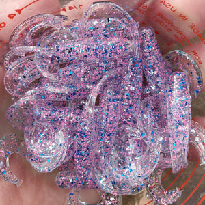 Color Code 0038:  Clear Plastic with pink glitter, blue glitter, silver glitter  (2 Inch Grub)