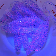 Load image into Gallery viewer, Color Code 0017: Clear Plastic with Pink Glitter, Silver Glitter, and Blue Glitter with UV (Jumping Jack under  UV light)
