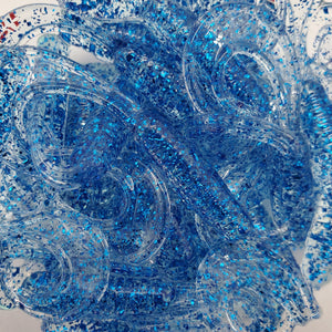 Color Code 0035: Clear Plastic with small and fine blue glitter