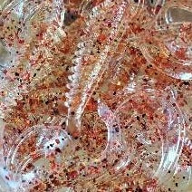Color Code 0005 - Opa’e - Clear Plastic with assorted size red, orange, and black glitter
