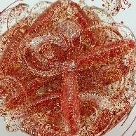 Load image into Gallery viewer, Color Code 0040: Clear Plastic with small and fine red glitter 2.5 Inch Grub