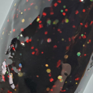 Color Code 0036:  Jay's black - Black Plastic with  assorted sized red glitter and holographic gold glitter