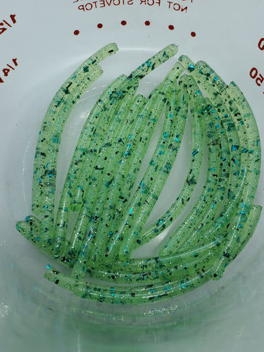 Color Code 0016: Emerald Plastic with Blue Green Obake; Our Special Blend of Green/Blue Glow; Assorted Sized Emerald Glitter, Blue Glitter, and Gold Glitter